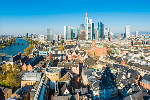 Aerial panoramic view across Frankfurt’s dynamic skyline, from the historic landmarks of the Old Town to the futuristic spires of the banking skyscrapers and the shops of Zeil and Hauptwache, Hesse, Germany.
