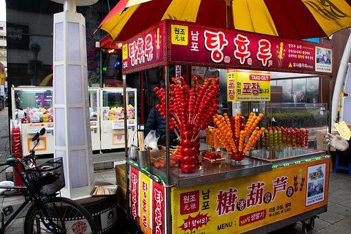 Local hawker stall traditional korean gourmet on street food bazaar market for travelers people travel visit and eat drinks at Nampo dong or Gwangbok dong on February 18, 2023 in Busan, South Korea
