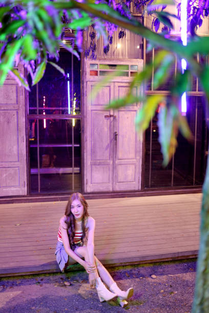 istock Girl in Neon Light 1473729215