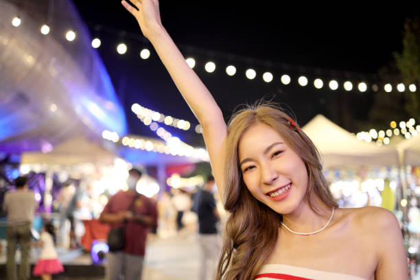 istock Girl in Night Market 1473729255