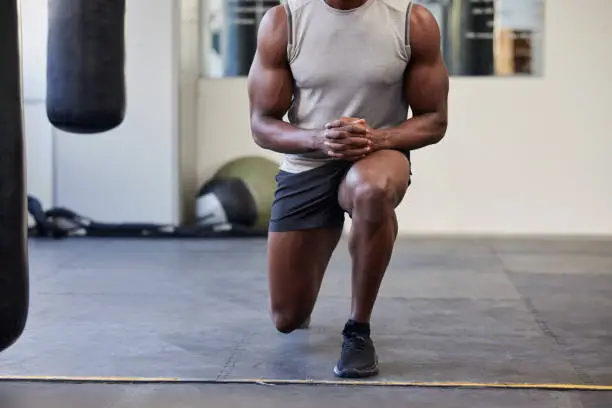 Photo of Black man, fitness and legs lunge workout at gym for bodybuilder athlete muscle strength. Health, wellness and exercise lifestyle of african athletic man at training club for muscular body.