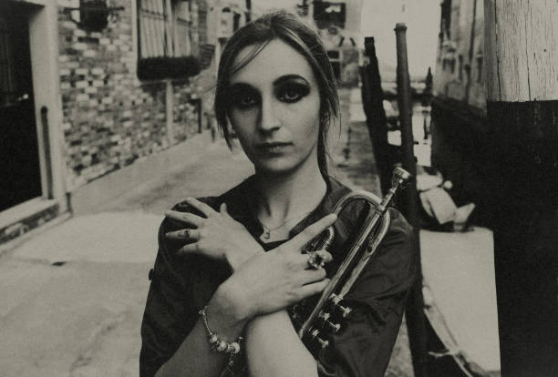 istock The female musician in Venice. 1473732533