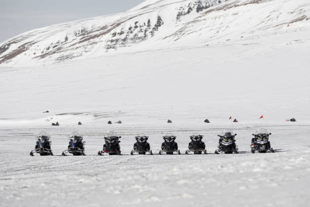 istock Snowmobile expedition in Svalbard, Norway. 1473734288