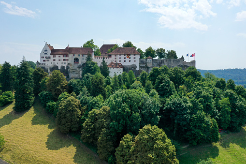 REGENSBURG, GERMANY - JUNE 21, 2018:  The Royal Villa aka Königliche Villa is a beautiful neo-Gothic three-storey stone building with stepped gable roof  and turrets.  The Villa was built in 1854-56 by Ludwig Foltz as a summer residence for King Maximilian II. Rumor has it that the King spent only one night here.