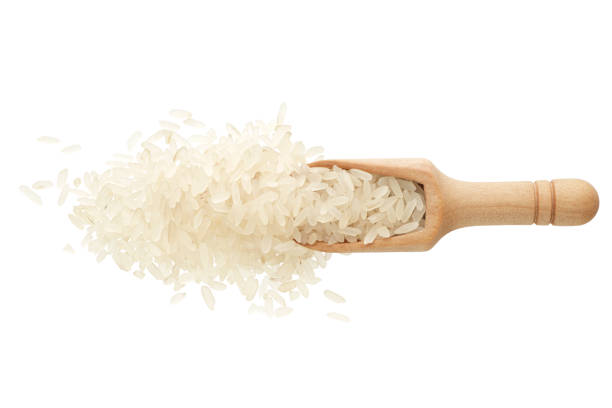 istock White rice in a wooden spoon 1473739533