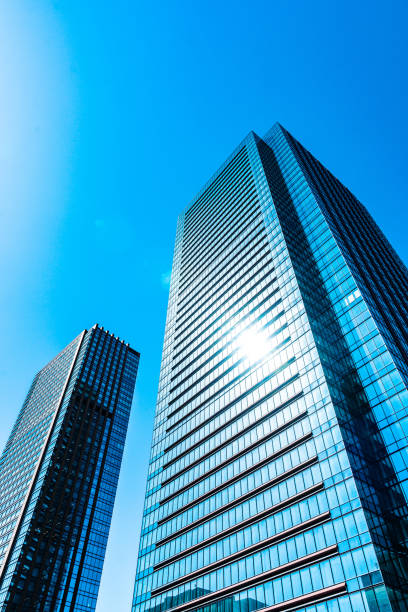 istock Looking up view of office building, Tokyo 1473745995