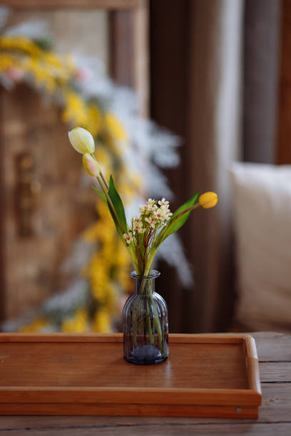 istock Glass vase with fresh flowers. 1473746115