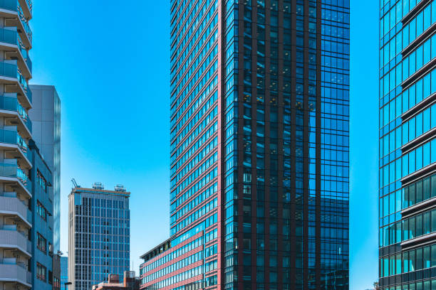 istock Looking up view of office building, Tokyo 1473747579