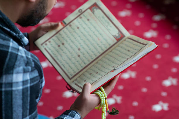 istock Man is reading Quran in Ramadan 1473747874