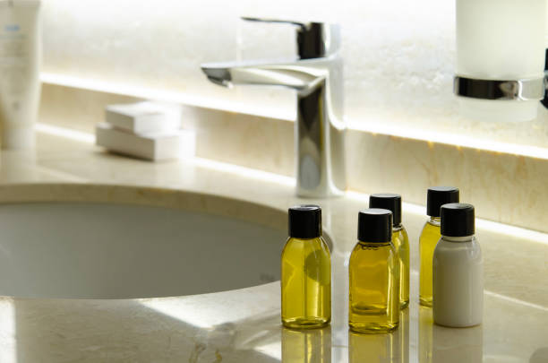 istock Containers with shampoo and hair conditioner. 1473758525
