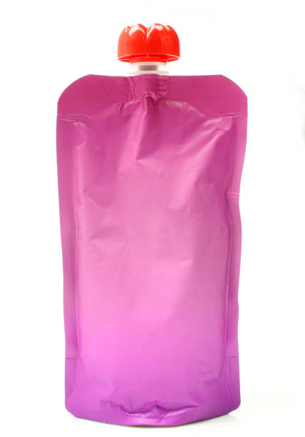 istock Blank purple puree bag. Liquid container packaging isolated on white background 1473759637