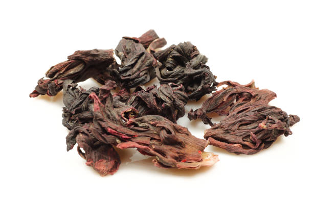 istock Dry hibiscus isolated on white background. Tea ingredient plant 1473760912