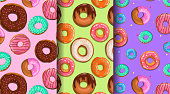 istock Yummy donuts with glaze seamless patterns set. Sweet food backgrounds collection. Best for birthday parties designs. Vector illustrations. 1473761167
