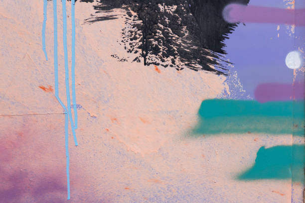 istock Messy paint strokes and smudges on an old painted wall background. Abstract wall surface with part of graffiti. Colorful drips, flows, streaks of paint and paint sprays 1473763444