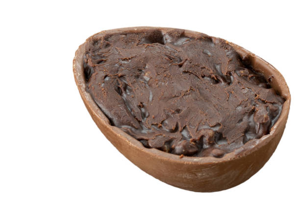 istock Chocolate Easter egg stuffed with dark chocolate and nuts. Traditional Brazilian sweet. 1473765316