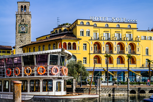 Riva del Garda, Italy - January 11: historic buildings at the old town of Riva del Garda on January 11, 2023