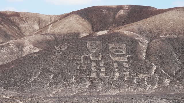 Two human figures called El Shaman de Palpa part of newly discovered group of geoglyphs made in the soil of the Nazca Desert in southern Peru