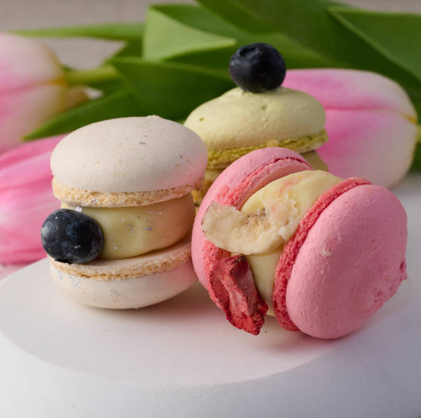 istock Baked macarons with different flavors on the table, dessert 1473766562
