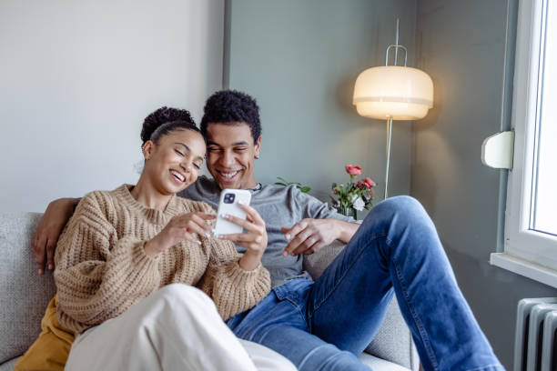 istock Couple enjoying the weekend at home 1473768655