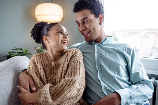 istock Couple relaxing at home on the weekend 1473768697