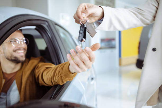 istock A young man buys a new car 1473772883