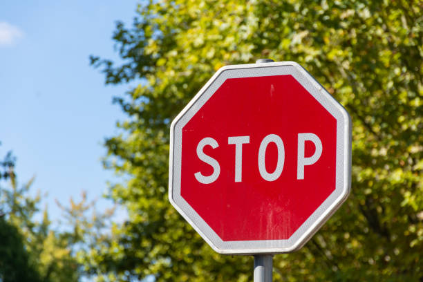 istock Stop sign requires vehicle to stop 1473777185
