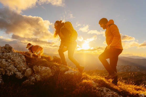 istock hiking in the mountains at sunset 1473779816
