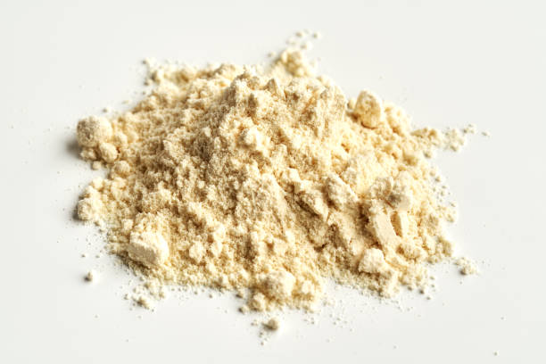 istock A heap of whey protein powder on white background 1473781289