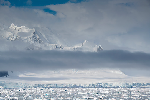 cruise ship on the background of a beautiful landschaft off the coast of Antarctica