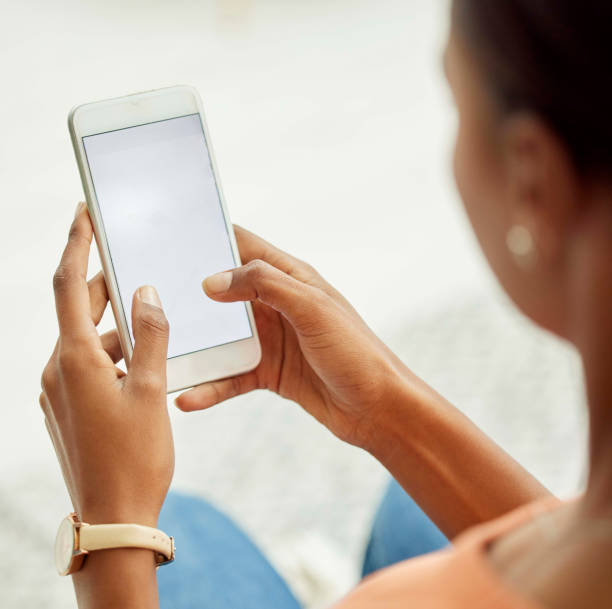 istock Smartphone, screen and woman hands with mockup for mobile chat app, product placement and branding design zoom. Typing, using phone or cellphone for social media, networking or online website search 1473785597