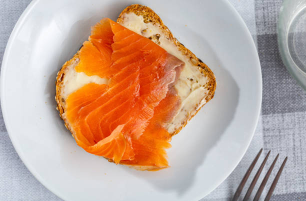istock One sandwiches with white bread butter and smoked salmon 1473785702