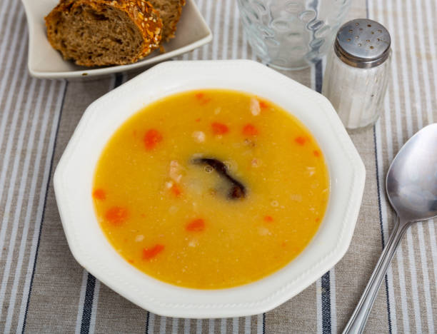 istock Hot pea soup with smoked meats and vegetables 1473786662