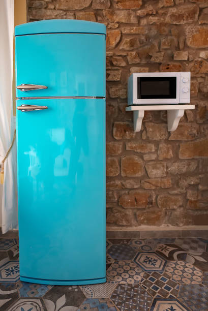 istock Retro refrigerator freezer standing on the kitchen. 1473788265