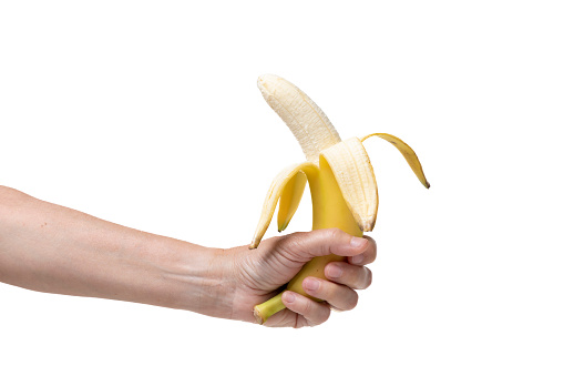 Woman holding a banana