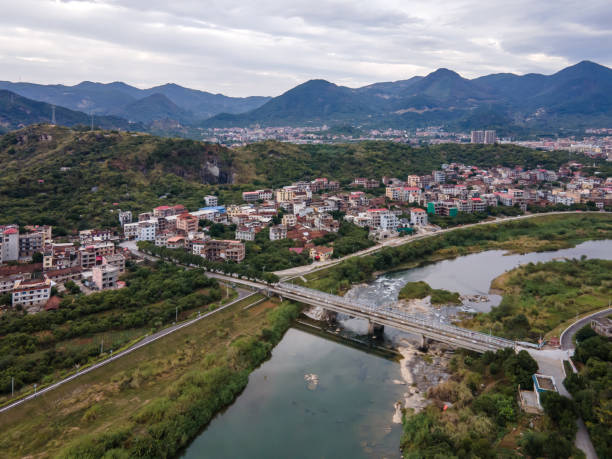 istock Town and mountains along the river 1473799476
