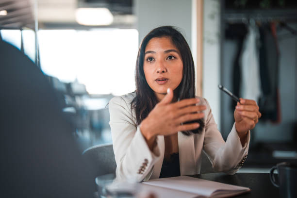 Japanese Businesswoman Talking and Using Hands