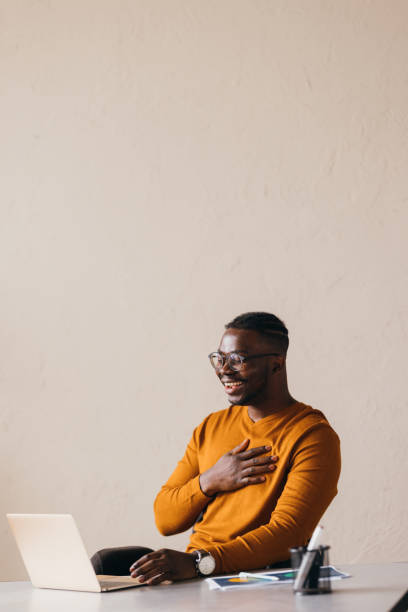 istock A Happy Businessman With Glasses Working On His Computer 1473801281