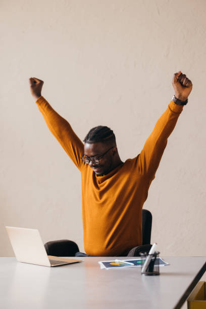 istock A Happy Businessman With Glasses Looking Excited While Working On His Computer 1473801284