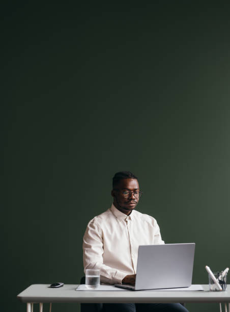 istock A Serious Businessman With Glasses Working On His Computer 1473801288