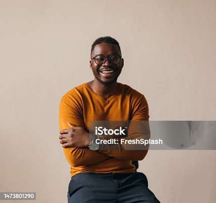 istock A Happy Businessman With Glasses Looking At Camera 1473801290