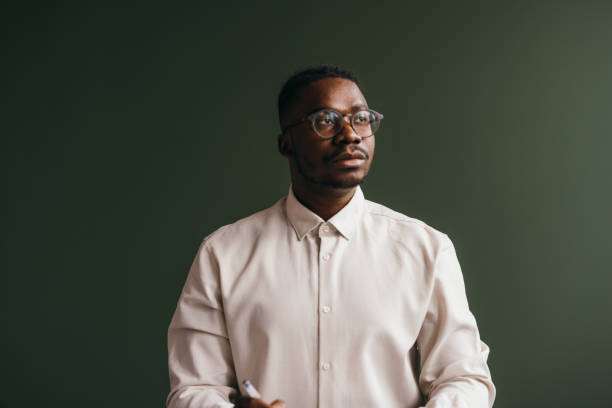 istock A Pensive Businessman With Glasses Looking Away While Contemplating 1473801318