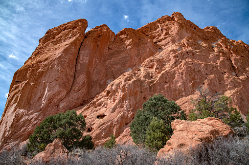 Massive, tall red sandstone rock formations in the Garden of the Gods of Colorado Springs, Colorado in western USA of North America.