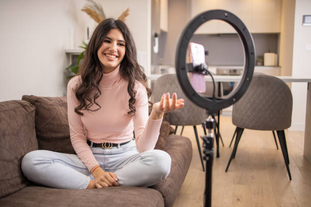 istock Young woman is recording a vlog 1473802752
