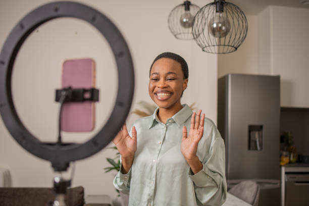 istock Young woman is recording a vlog 1473802774