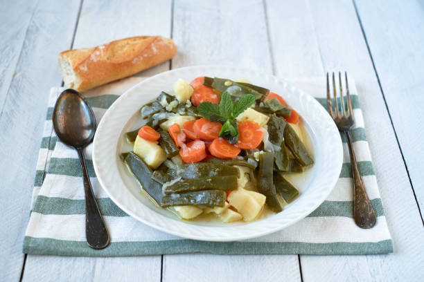 istock Green beans cooked with potatoes and carrots 1473808942