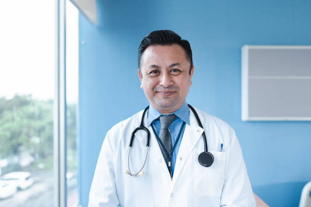 istock Experienced senior doctor with stethoscope in clinic 1473814313