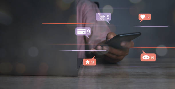 istock Man using social media shopping online marketing with notification icons. 1473819085