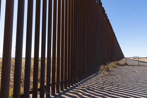 El Paso, Texas, Mexico, Border Wall, harsh shadows