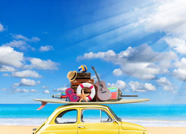 istock Vintage yellow car with Surfboard and beach stuff on beach in sunny 1473830408