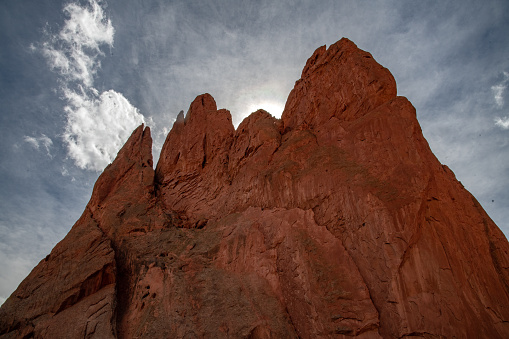 Tall and massive red sandstone formations in the Garden of the Gods at Colorado Springs, Colorado in western USA of North America
